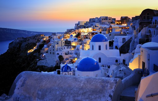 Blue domed buildings in buildings of Santorini in Greece