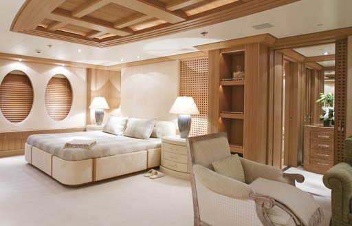 timeless master suite with oak panelling on board superyacht Deja Too