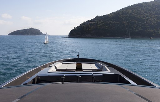 bow seating area looks out over the horizon on board motor yacht Lucky Me 