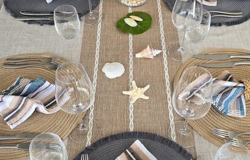 Tablescape of shells and nautical napkins