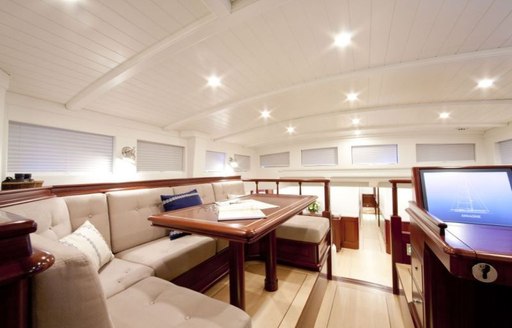 U-shaped sofa seating on luxury yacht Aurelius 111