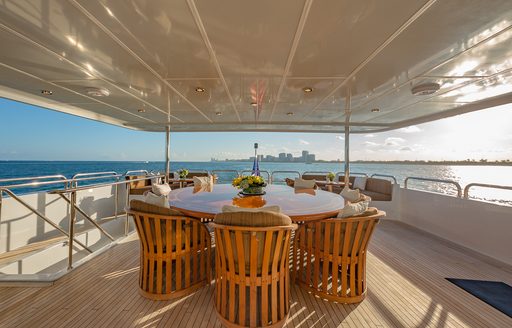 Charter yacht I LOVE THIS BOAT exterior with circular dining table