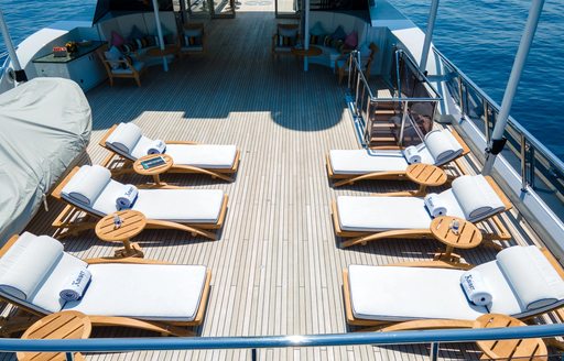 Sun loungers onboard charter yacht KAISER