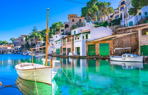 gorgeous boat on water in bay 