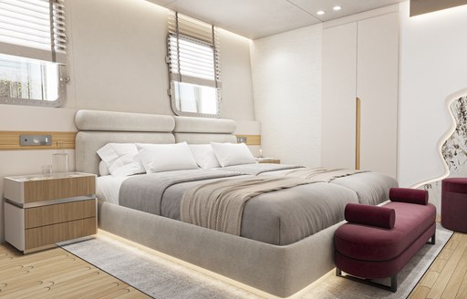 Guest cabin onboard charter yacht REPOSADO, central berth with red bench at the end and two small windows above