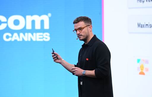 Speaker on stage at MIPCOM