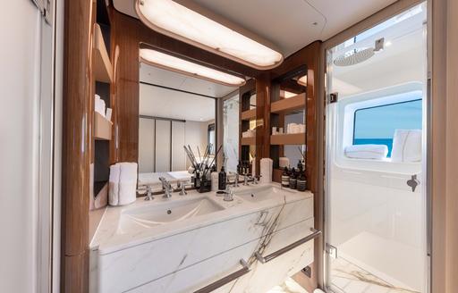 Charter yacht OCEAN ONE ensuite facility with marble sink unit