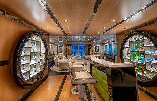 Charter yacht SCOTT FREE interior wet bar and stools