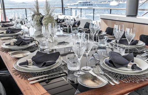 Alfresco dining table set for dinner onboard MY Severin's