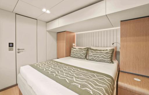 Charter yacht AMITATU guest cabin with double berth