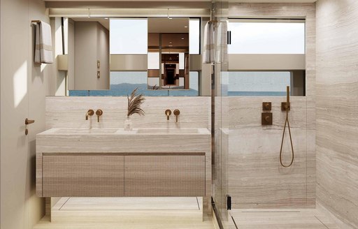 Ensuite facilities for the master cabin onboard charter yacht MARY, his and hers sinks with a shower room