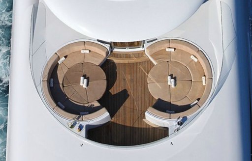 curved seating areas on foredeck of charter yacht CAPRI 