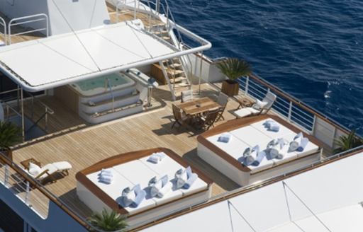 expedition yacht TITAN's sun pads and deck jacuzzi