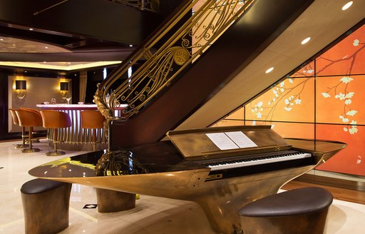 Grand piano onboard charter yacht WHISPER