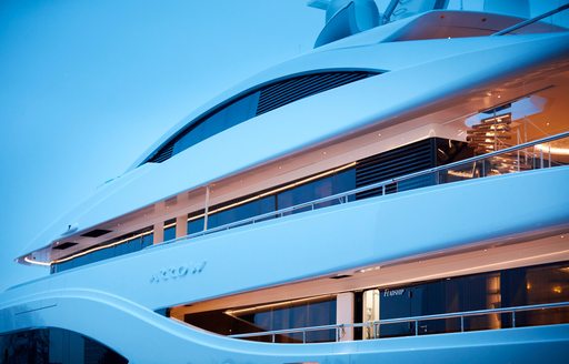 the side profile of superyacht arrow in the Mediterranean showcasing her name 