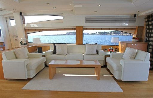 lounge area in main salon of charter yacht FIRECRACKER