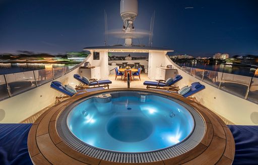 Charter yacht MISS CHRISTINE deck Jacuzzi at night