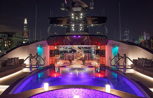 Swimming pool onboard MY Kismet at night