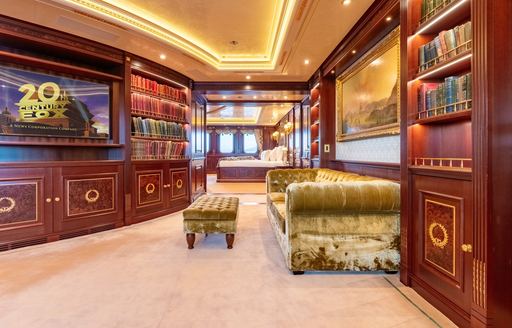 Charter yacht BLACK PEARL library with TV screen