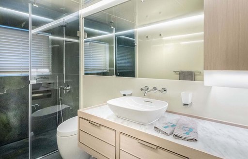 En-suite on explorer yacht 'Seven Diamonds', with sink and shower