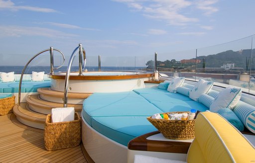 Jacuzzi and sun pads on board OASIS