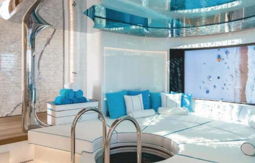 Charter yacht LADY S interior seating under a pool