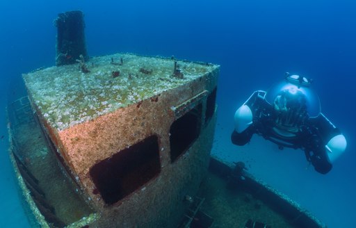 submarine with charter guests explore the underwater world of Antarctica