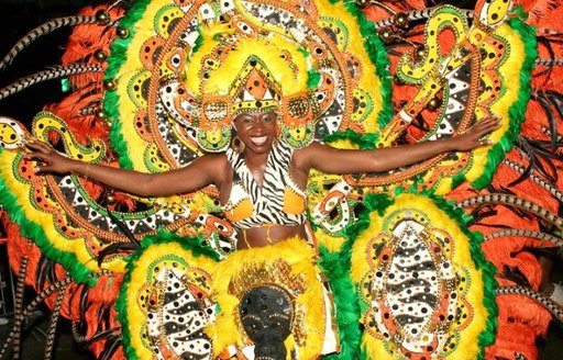 female dancer in colourful Full-body cardboard costume at junkanoo