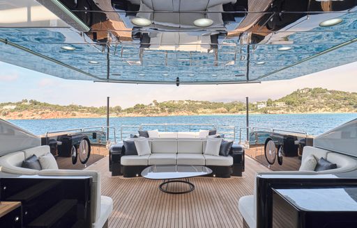 Charter yacht ABILITY exteriors with seating under overhang