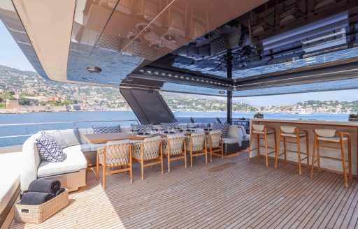 Charter yacht AMITATU exteriors with alfresco dining setup