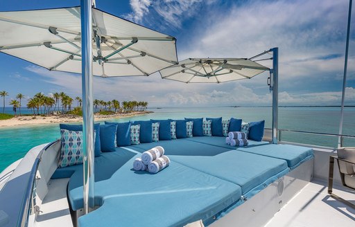 Luxury superyacht At Last sundeck sunpads