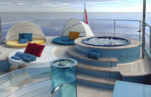 Jacuzzi and sun pads on sundeck of superyacht PHILMI