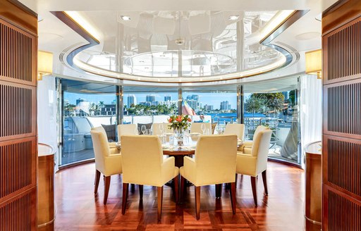 Charter yacht SEASCAPE V interior dining area with large windows