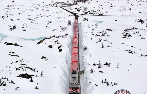White Pass & Yukon Route Railway train going through snow