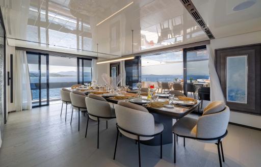 Interior dining area onboard charter yacht ACQUA CHIARA