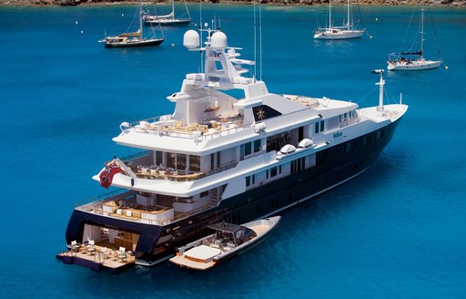 superyacht Helios anchors on a Caribbean yacht charter and opens up beach club