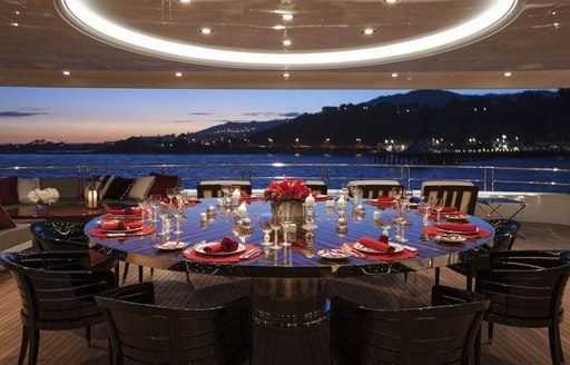 beautiful dining area onboard luxury superyacht charter INVICTUS