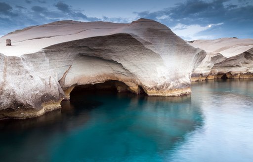 milos lunar beach, with caves and blue sea