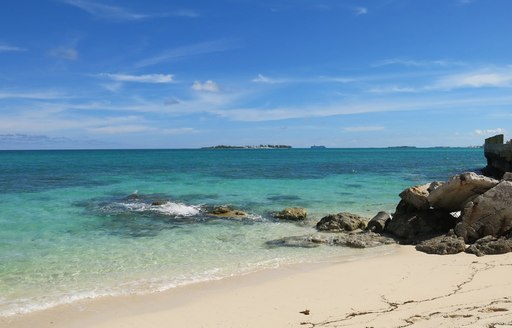 Rocky line leading into the sea on Cabbage Beach