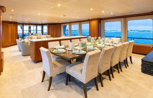 Charter yacht SEA CLASS interior dining table with large windows
