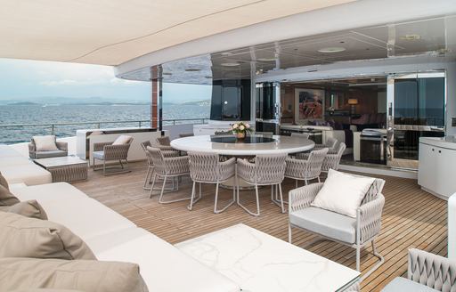 Charter yacht TALEYA exterior dining area with extra seats