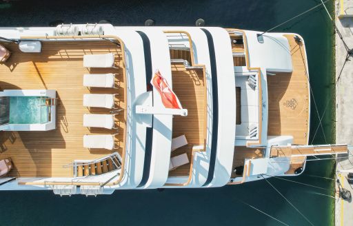 Aerial view looking down on aft decks of charter yacht SEAKID II