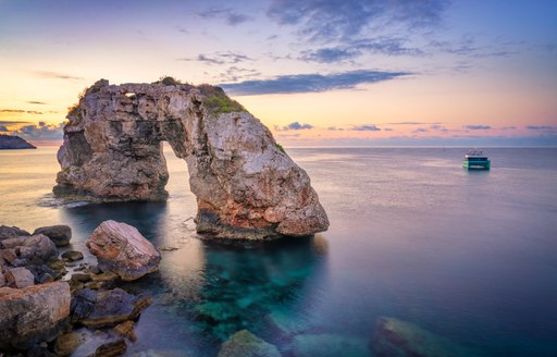 rocky outcrop in water in the balearics