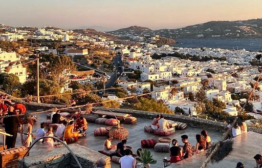 180 Sunset Bar at dusk with DJ playing set