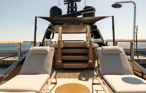 Pair of sun loungers onboard charter yacht RAJA²