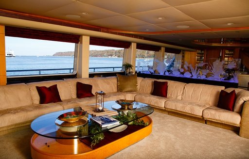 L-shaped sofa in main salon of superyacht Island Heiress