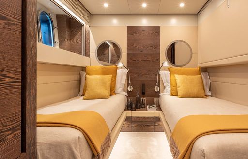Charter yacht LA GIOCONDA twin cabin with yellow furnishings