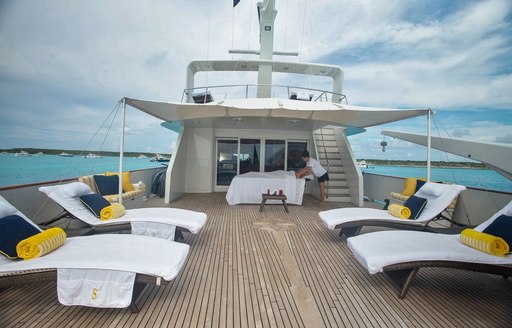 Guest enjoying a massage on SUNSHINE's bridgedeck