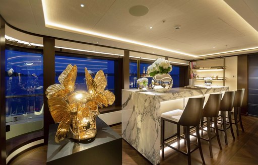 lunasea yacht statues and marble clad bar