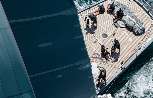 sailors on deck at nz millennium cup